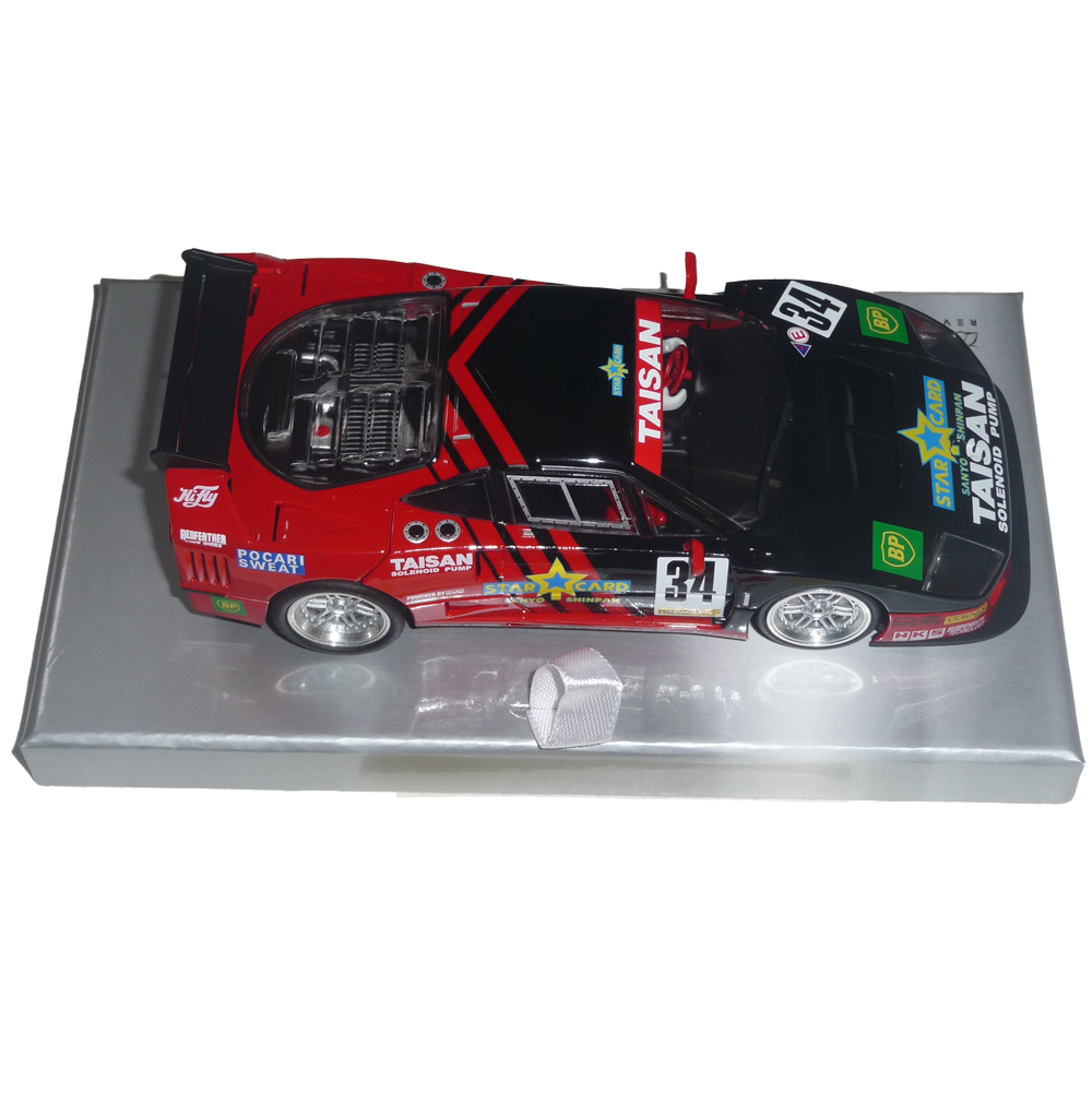 REVO SLOT RS0098 - Ferrari F40 - Taisan BP #34  https://www.flatoutslotcars.com.au/products/revo-slot-rs0098-ferrari-f40-taisan-bp-34  CHASSIS: Aluminium floating adjustable chassis MOTOR: 21,000rpm MOTOR CONFIGURATION: Anglewinder AXLE: calibrated steel 3mm with brass axle spacers BALL BEARINGS: front and rear GEARS:Spur 33t/ Pinion 12t MAGNET: supplied but requires installation WHEELS: Alloy TYRES: Rear high grip; front low profile GUIDE: Standard l…