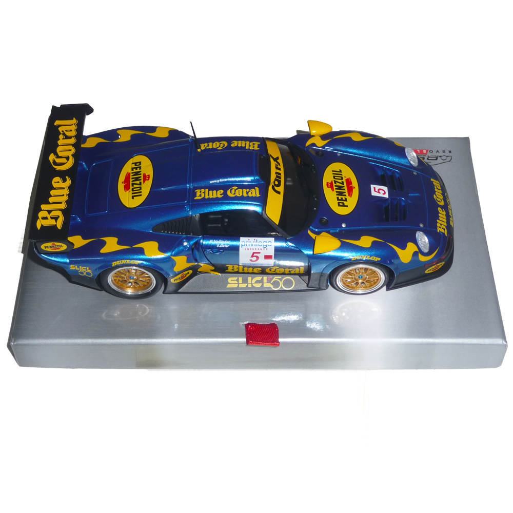 RS0103 - Porsche 911 GT1 - SPA 1999 - Blue Coral #5  https://www.flatoutslotcars.com.au/products/rs0103-porsche-911-gt1-spa-1999-blue-coral-5  WHERE: SPA 1999 British GT Championship CHASSIS: Aluminium floating adjustable chassis LIGHTS: None MOTOR: 21,000rpm MOTOR CONFIGURATION: Anglewinder AXLE: calibrated steel 3mm with brass axle spacers BALL BEARINGS: front and rear GEARS: Spur 33t / Pinion 12t MAGNET: supplied but requires installation WHEELS: Alloy TYR…